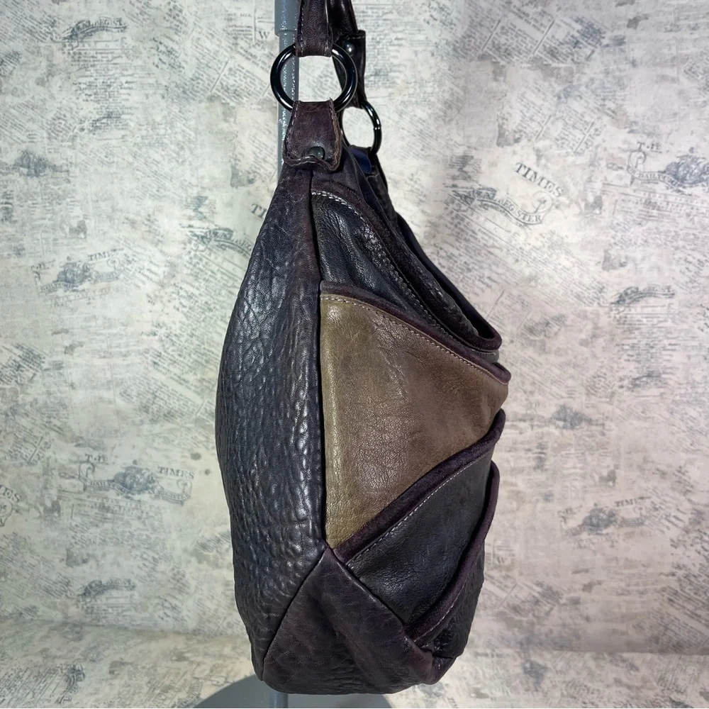 Innue leather purple and tan rustic hobo shoulder bag made in Italy